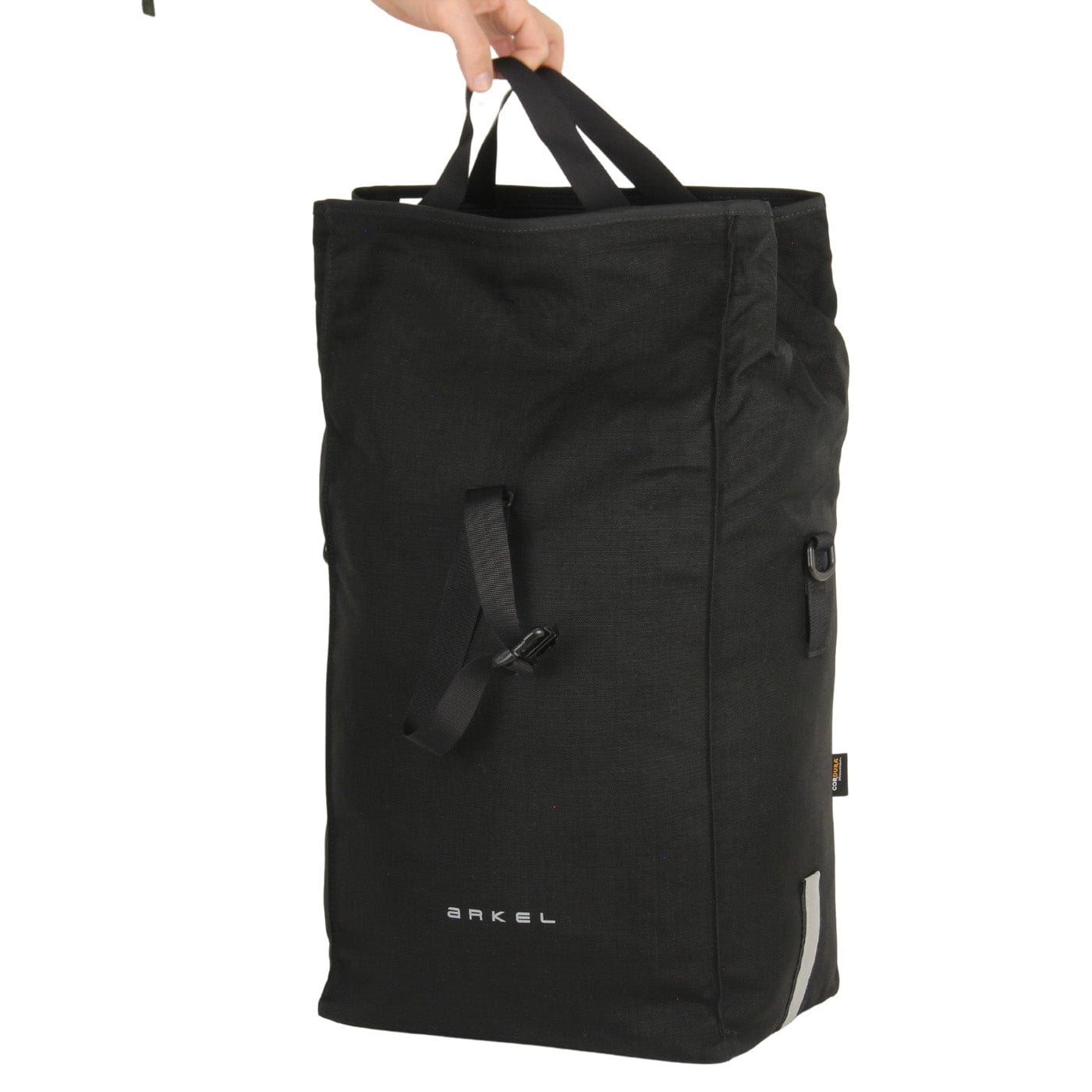 The Signature V waterproof urban laptop pannier can be carried with two shopping bag style carry handles located at the top of the bag when fully open 
